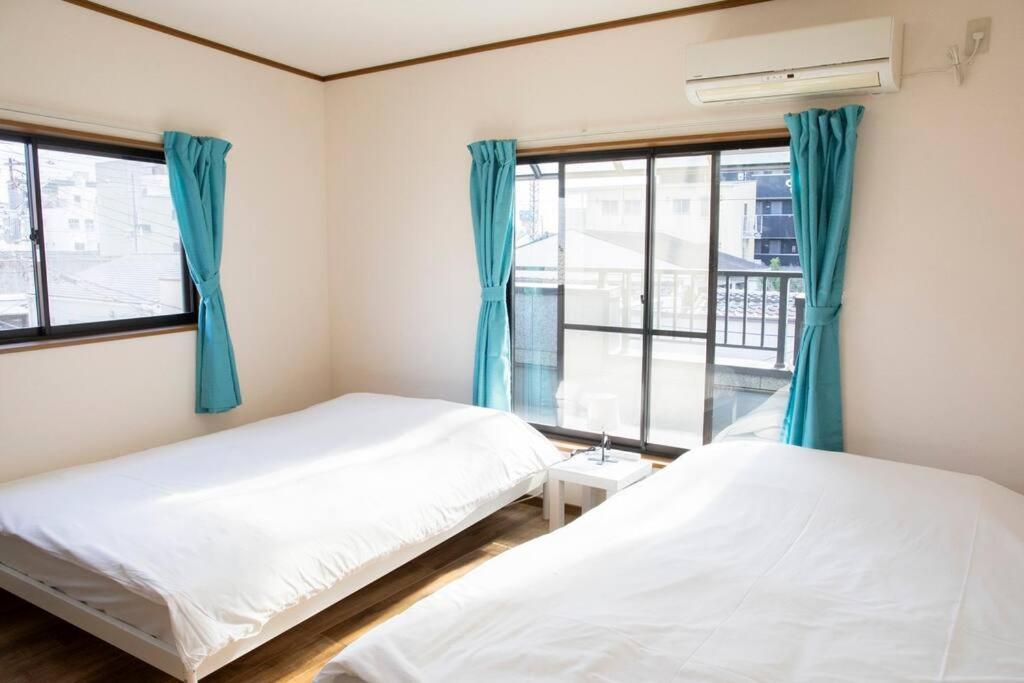 Apartment ゲストハウスわん花園北